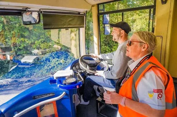 Would-be drivers get behind the wheel at free Kinchbus Try Drive event